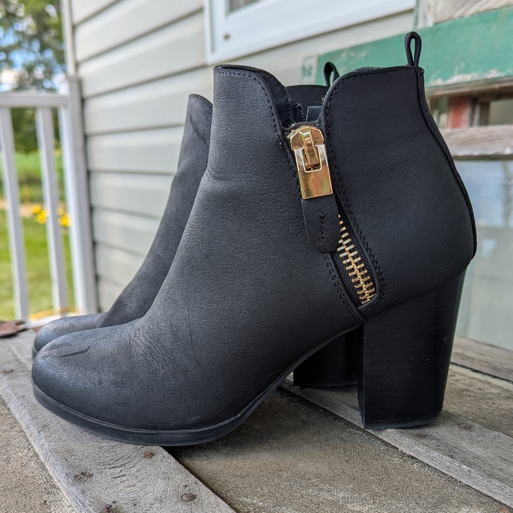 Elegant Black Ankle Boots with Gold Accent